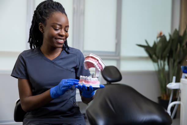 Dental Implants vs Dentures Dental Implants vs Dentures